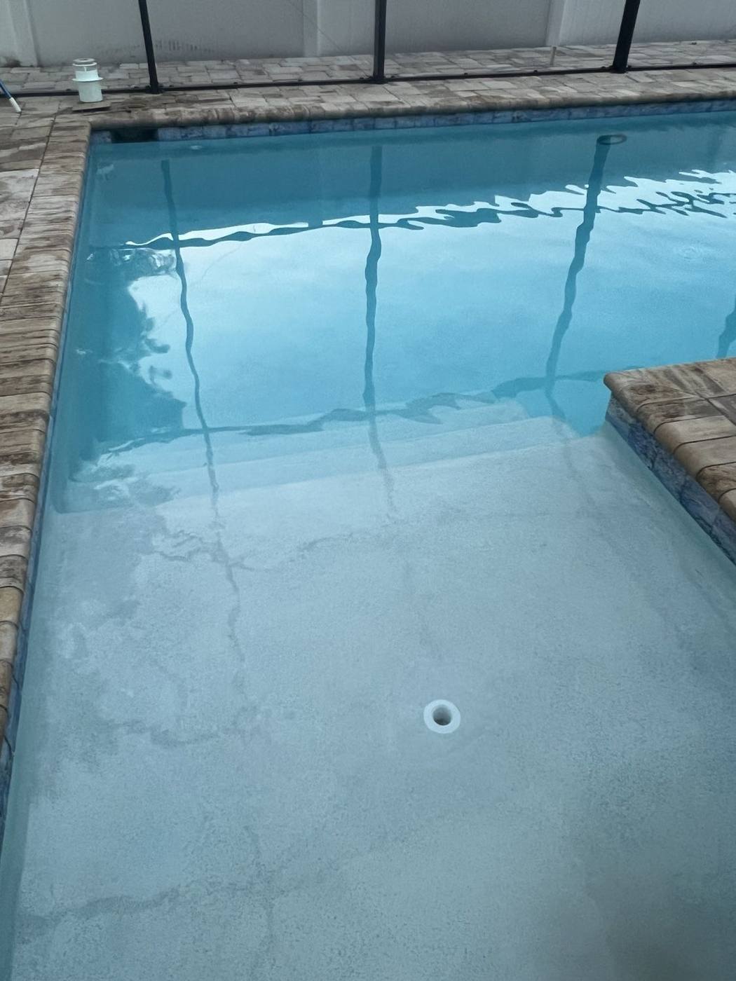 Clear rectangular pool with a clean shallow ledge